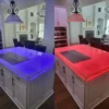 StoneGlow-LED-Sheet-CounterTop two countertops using StoneGlow LED sheets. Red and Blue LED lights
